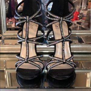Black sparkly caged heels.